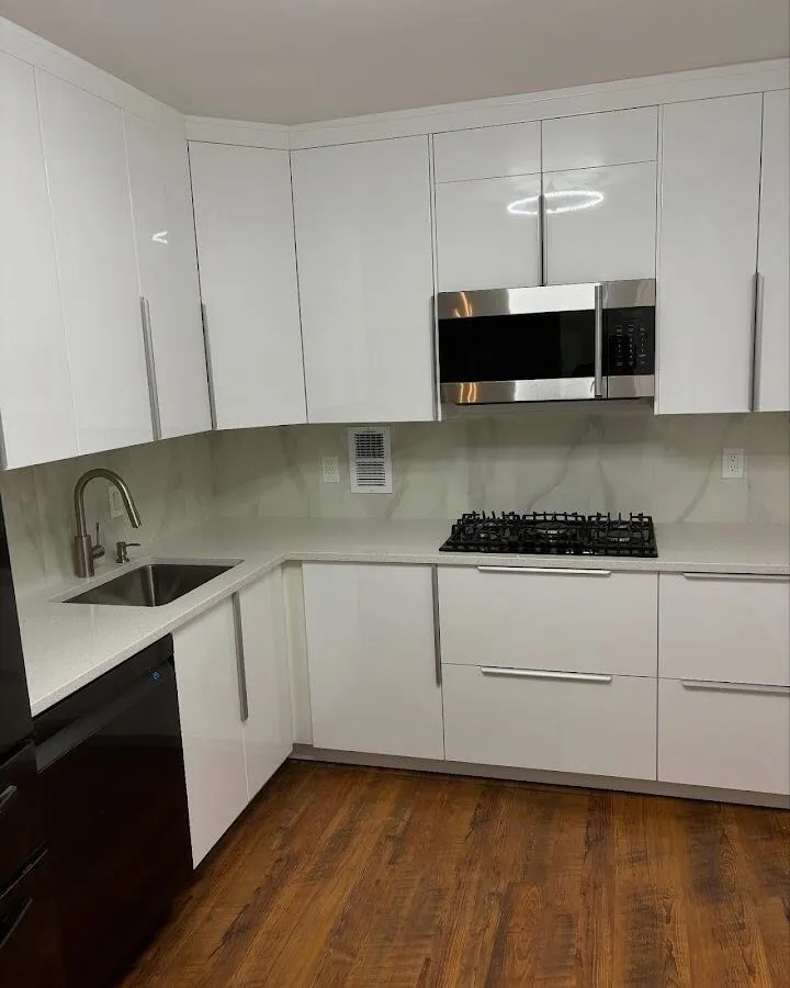 Restored kitchen with white cabinets after water damage in Weston